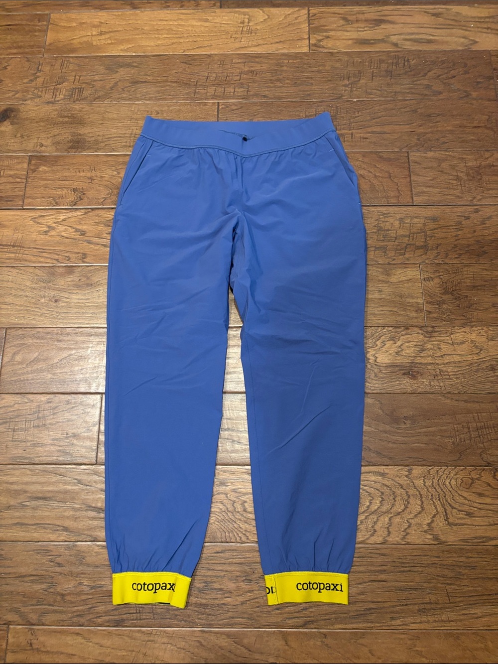 cotopaxi Blue Joggers with Yellow Branded Cuffs